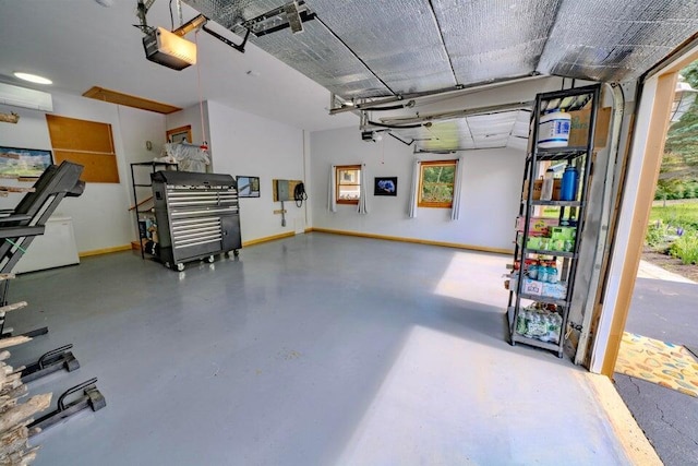 19 Glenview Ln, Belfast, ME 04915 - garage with a garage door opener and baseboards