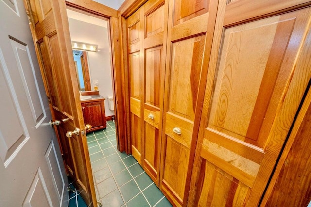 19 Glenview Ln, Belfast, ME 04915 - corridor featuring dark tile patterned floors
