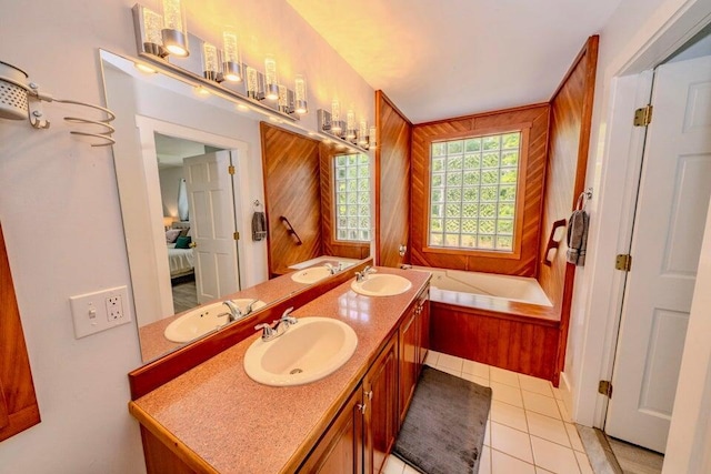19 Glenview Ln, Belfast, ME 04915 - full bath featuring connected bathroom, double vanity, a bath, and tile patterned floors