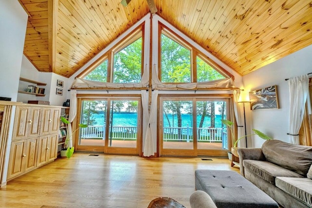 19 Glenview Ln, Belfast, ME 04915 - living room with wooden ceiling, high vaulted ceiling, wood finished floors, and healthy amount of natural light