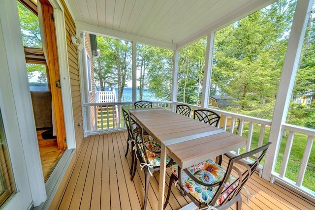 19 Glenview Ln, Belfast, ME 04915 - sunroom / solarium with a water view, outdoor dining space, healthy amount of natural light, and view of scattered trees