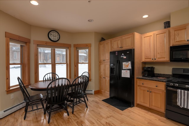 kitchen featuring light brown cabinets, baseboards, light wood finished floors, recessed lighting, and black appliances