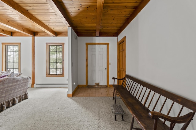 bedroom with a baseboard heating unit, baseboards, wood ceiling, carpet floors, and beam ceiling