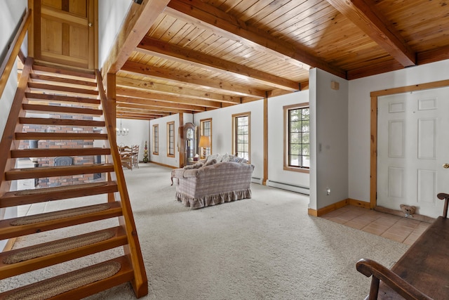 tiled living area featuring stairs, beamed ceiling, carpet, and a baseboard heating unit