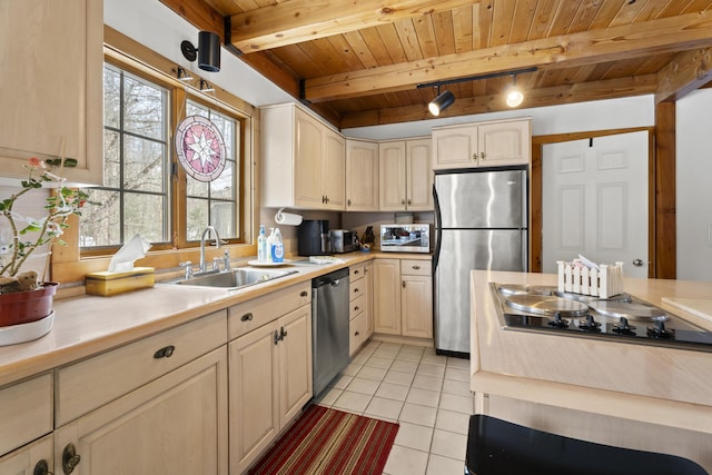 kitchen with a sink, stainless steel appliances, wooden ceiling, light countertops, and light tile patterned floors