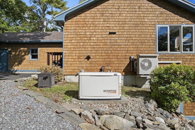 view of property exterior with a cooling unit and roof with shingles