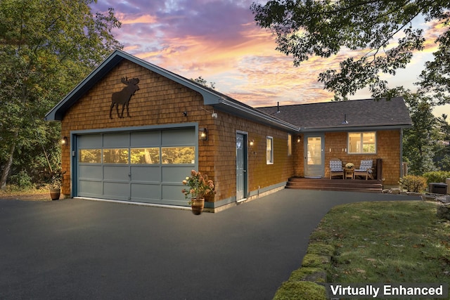 view of front facade with a garage and driveway