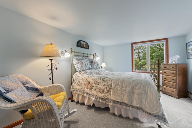 bedroom with carpet and baseboards