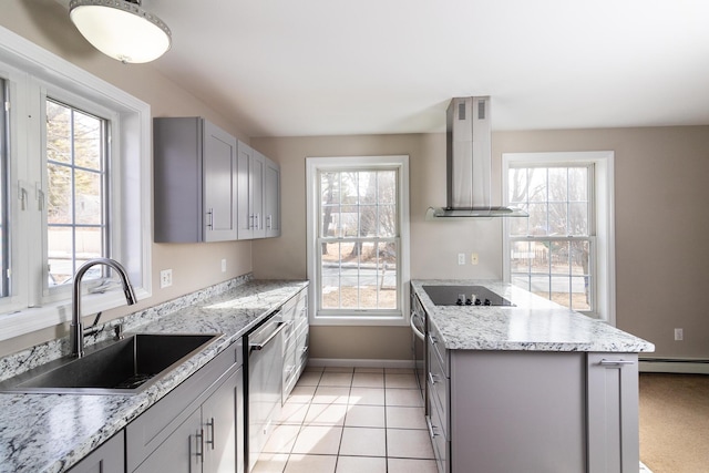 kitchen featuring dishwasher, wall chimney exhaust hood, gray cabinets, and a sink