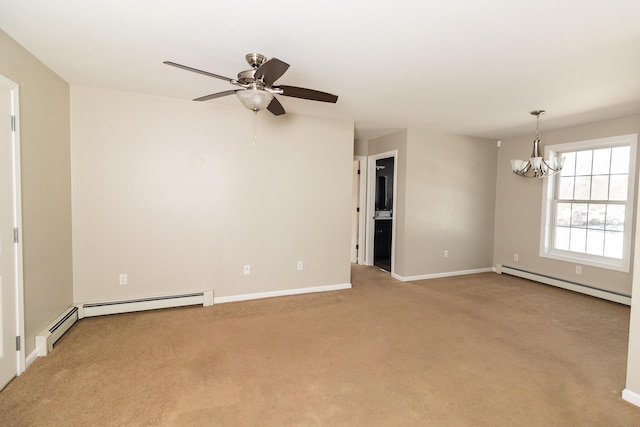 empty room featuring light carpet, ceiling fan with notable chandelier, baseboards, and a baseboard radiator