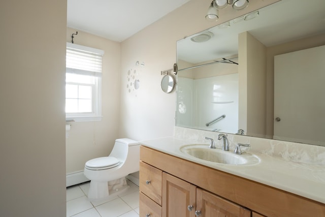 bathroom featuring a baseboard radiator, toilet, vanity, and tile patterned flooring