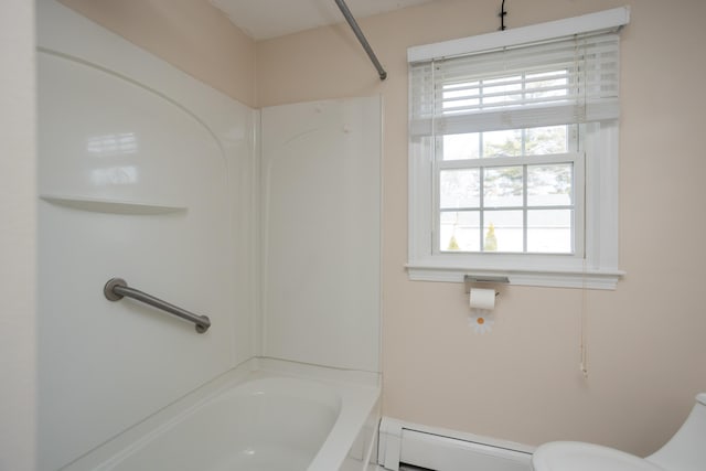 full bath with shower / bath combination, toilet, and a baseboard heating unit