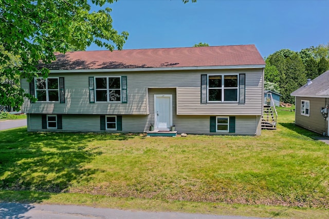 18 Oak St, Camden, ME 04843 - split foyer home featuring a front yard and stairs