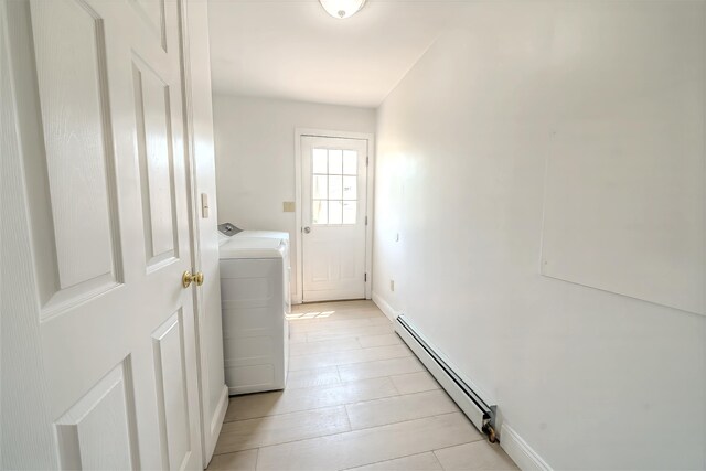 18 Oak St, Camden, ME 04843 - laundry room featuring a baseboard heating unit and independent washer and dryer