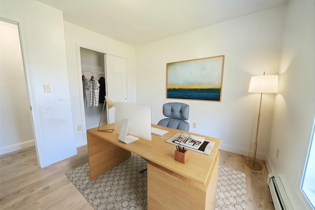 18 Oak St, Camden, ME 04843 - office space featuring light wood-style floors and a baseboard heating unit