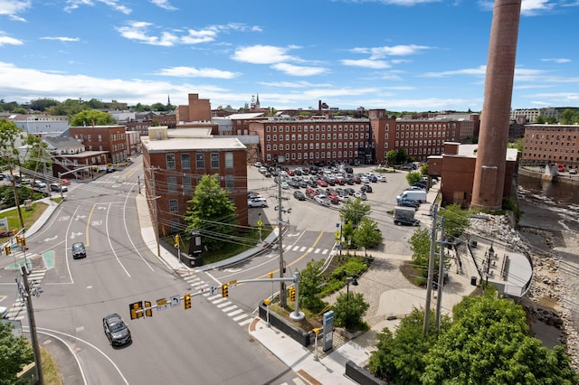 birds eye view of property with a view of city