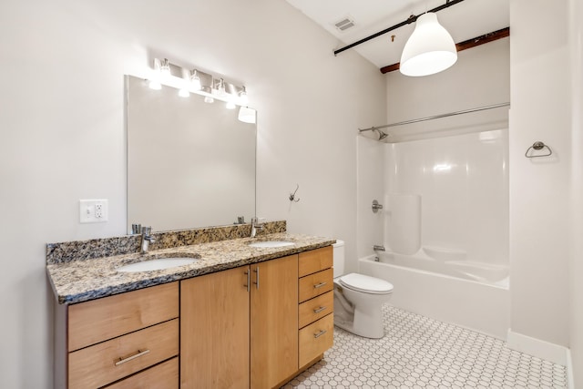 bathroom featuring double vanity,  shower combination, visible vents, and a sink