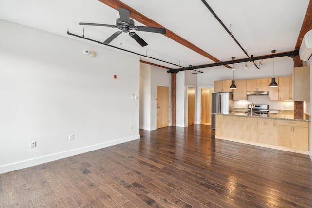 unfurnished living room with beam ceiling, dark wood-type flooring, a sink, baseboards, and ceiling fan