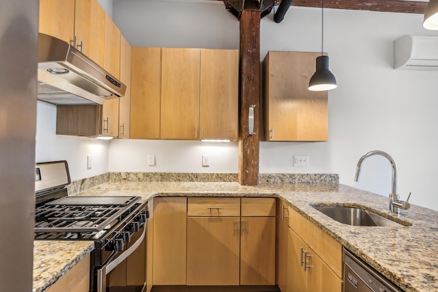 kitchen with a wall mounted air conditioner, under cabinet range hood, a sink, stainless steel appliances, and light stone countertops