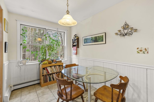 16 Rockaway Rd, Falmouth, ME 04105 - dining area with light tile patterned floors and wainscoting