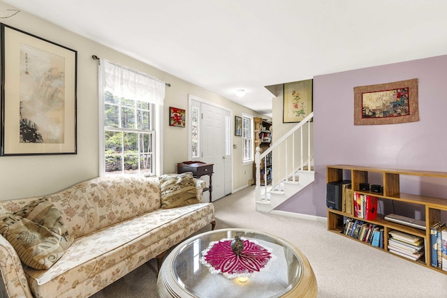16 Rockaway Rd, Falmouth, ME 04105 - carpeted living area with stairs and baseboards