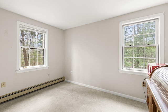 16 Rockaway Rd, Falmouth, ME 04105 - spare room featuring baseboards, light colored carpet, and baseboard heating