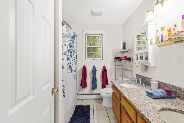 16 Rockaway Rd, Falmouth, ME 04105 - full bathroom featuring double vanity, tile patterned flooring, toilet, a baseboard radiator, and a sink