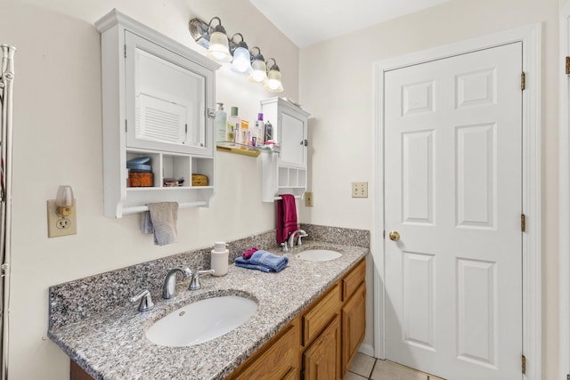 16 Rockaway Rd, Falmouth, ME 04105 - bathroom featuring a sink, double vanity, and tile patterned flooring