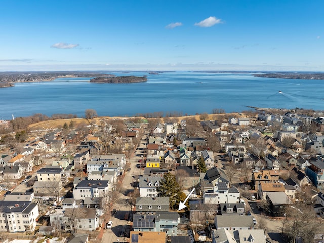 birds eye view of property featuring a residential view and a water view