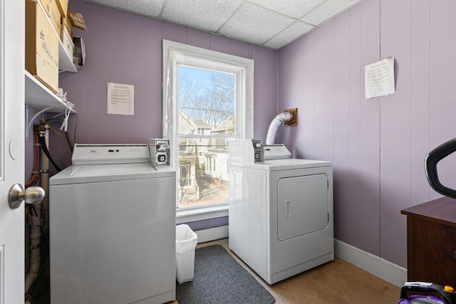 washroom featuring washing machine and dryer and laundry area