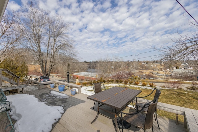 wooden deck featuring outdoor dining space