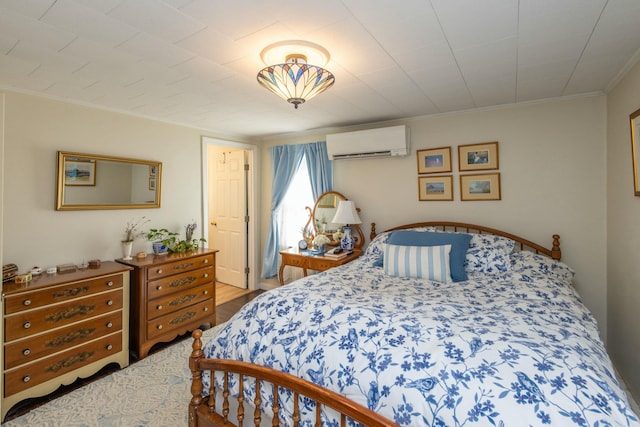 bedroom with ornamental molding and a wall mounted AC