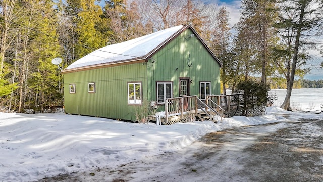 exterior space featuring a wooden deck