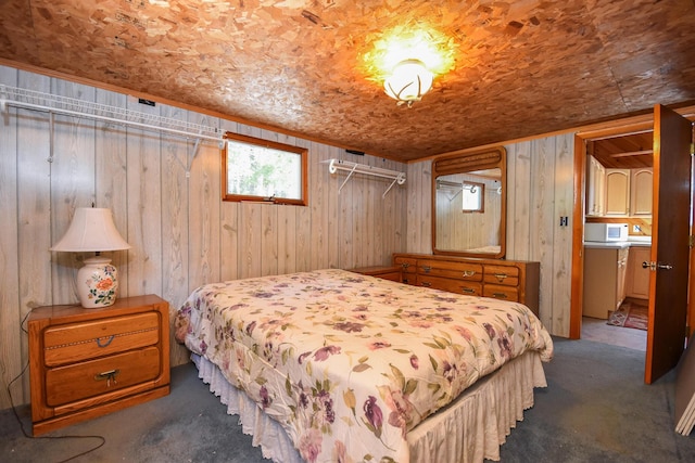 bedroom with wood walls