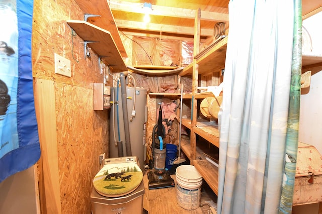 storage area featuring water heater