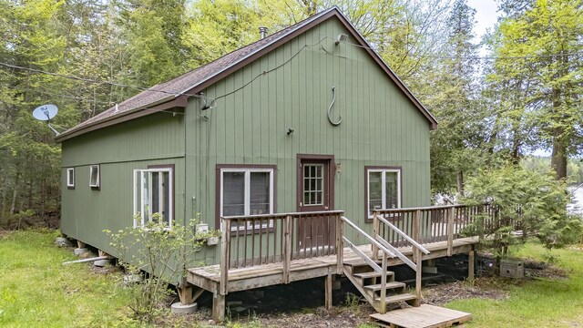 345 Tims Cove Rd, Willimantic, ME 04443 - rear view of property featuring a wooden deck and a shingled roof