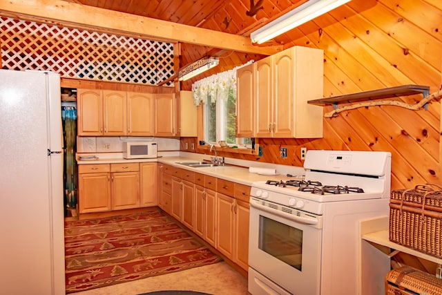 345 Tims Cove Rd, Willimantic, ME 04443 - kitchen with white appliances, a sink, light countertops, wood walls, and wooden ceiling