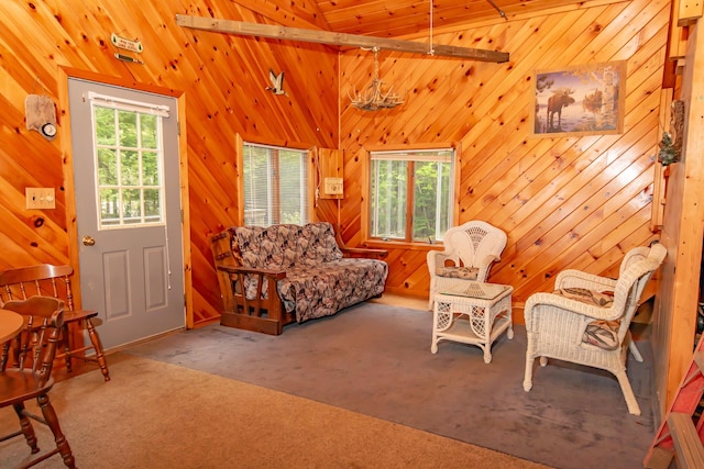 345 Tims Cove Rd, Willimantic, ME 04443 - carpeted living room with wooden walls