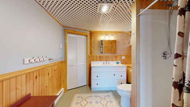 full bath with vanity, toilet, wood walls, a wainscoted wall, and curtained shower