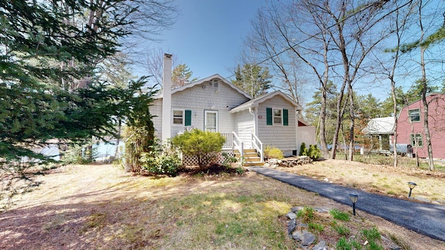 view of front of property with a chimney