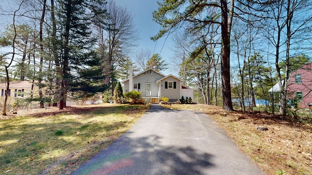 bungalow-style house featuring driveway