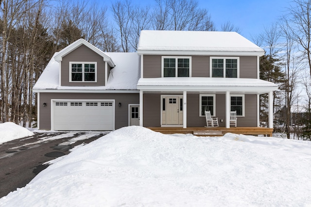 view of front of property with a porch and an attached garage