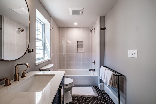 full bath with tile patterned flooring, visible vents, toilet, shower / bathtub combination, and vanity