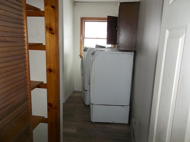 laundry area with washer and dryer, laundry area, and wood finished floors