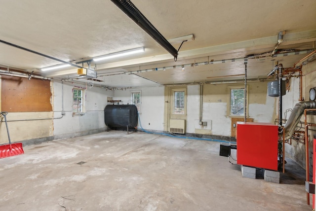 52 Main St, Sanford, ME 04083 - garage featuring heating fuel and a garage door opener