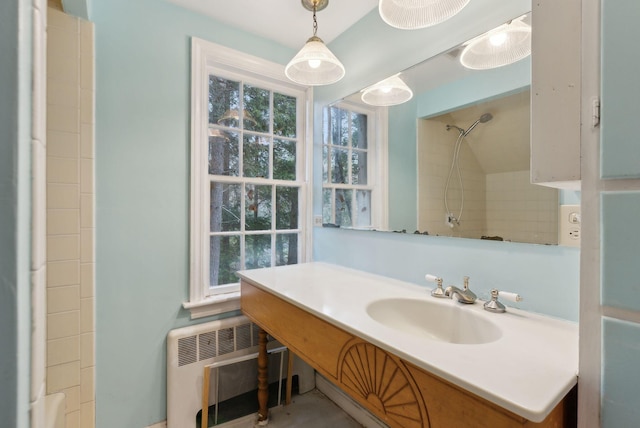 52 Main St, Sanford, ME 04083 - full bathroom featuring plenty of natural light, heating unit, radiator, and vanity
