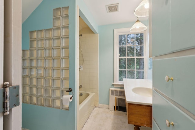 52 Main St, Sanford, ME 04083 - bathroom featuring radiator heating unit, vanity, washtub / shower combination, and visible vents