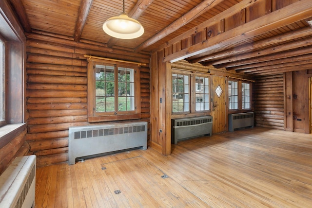 52 Main St, Sanford, ME 04083 - spare room featuring wooden ceiling, radiator, and beam ceiling