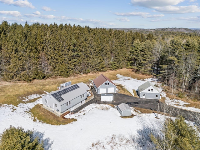 aerial view featuring a view of trees