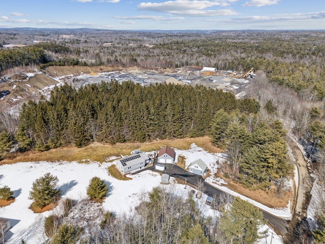 aerial view featuring a view of trees